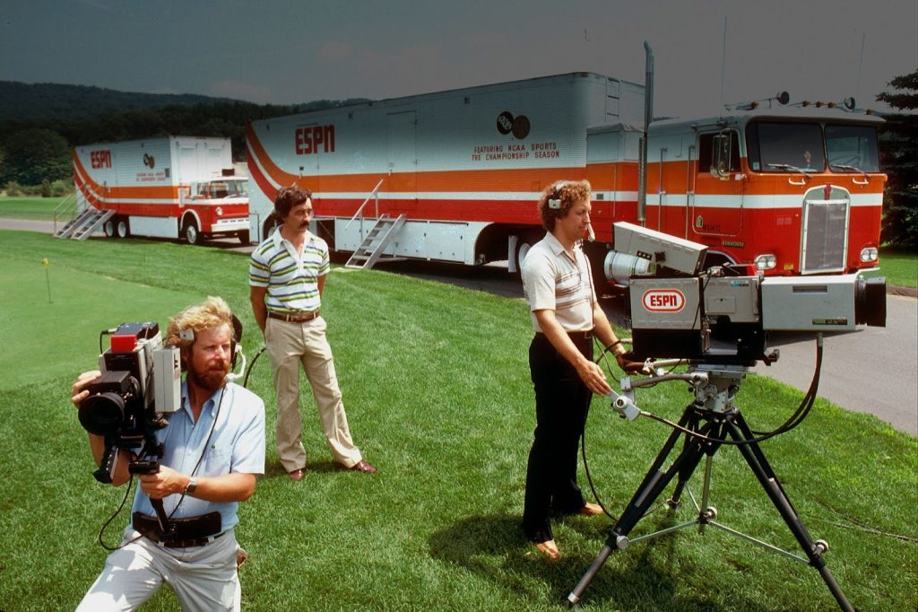 IMage of men with cameras filming