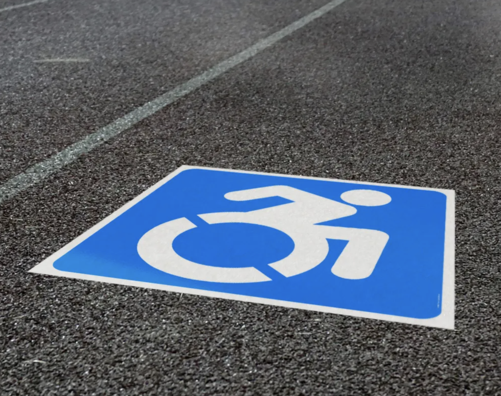 Handicap logo on the ground in a parking space